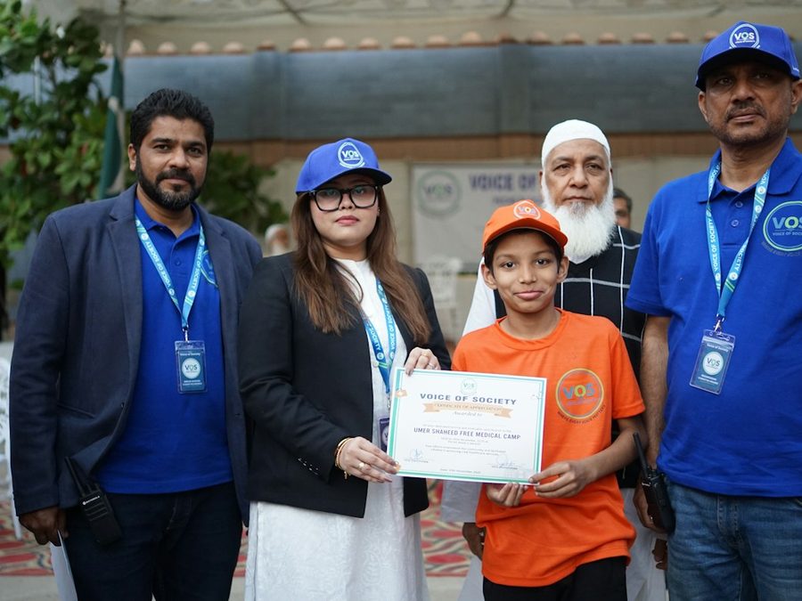 A donation check presented at a community nonprofit event.