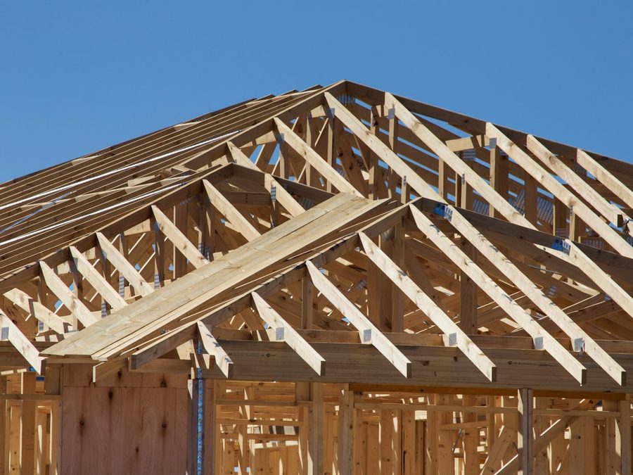 Roof trusses going up on a new home. Three of Colorado&rsquo;s five fastest-growing cities are in Weld County.